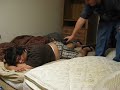 We stun gun our passed out friend in the gut We stun gun our passed out friend in the gut