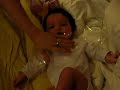 Baby playing with a noisy plastic bag Baby playing with a noisy plastic bag