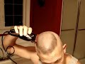 Shaving the top down with the Wahl Super Taper II.  No guard
