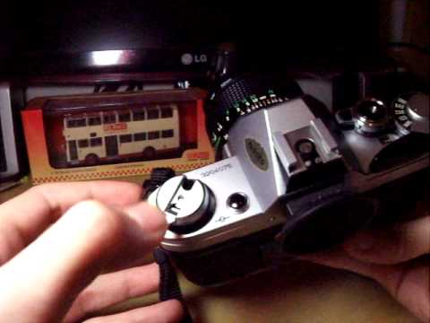 how to open a canon av-1 camera