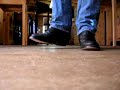 Olathe Cowboy Boots Stomping on a Wood Floor with Levis Olathe Cowboy Boots Stomping on a Wood Floor with Levis