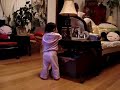 Kung Fu baby gets distracted by Fishes swimming