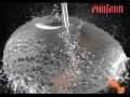 Super slow-motion popping of water balloon