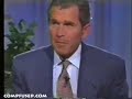 bush doing \"1 finger victory salute\" bush doing \"1 finger victory salute\"