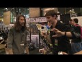 Host, Tim Dowd, interviews Gravel series illustrator, Mike Wolfer at NY Comic Con 2010 for The Take on Comics produced by Silver Cheese Productions and Media, LLC. William Gravel carves a bloody path of death in his first full-color collection! Gravel Volume 1 features the first eight issues (#0-7) of this on-going series from Warren Ellis and co-writer Mike Wolfer with art by Raulo Caceres and Oscar Jimenez, as well as a special cover gallery! Long-buried and lost in antiquity, a unique book of magic once existed, filled with such extraordinary and arcane spells, supernatural rites and inherent power that its possessor would be either unequaled, or driven irrevocably insane. Recently unearthed, the Sigsand Manuscript has been divided into six pieces and distributed among the Minor Seven, Britain's great Occult Detectives. With the Sigsand in their grasp, the Seven now wield more power than they were ever meant to possess... And William Gravel is not happy about it. Once a member of their Order but unceremoniously replaced within their ranks, the SAS Sergeant Major and Combat Magician is on a mission of revenge, redemption and quite possibly rebirth, as he takes on the members of the Minor Seven one-by-one... And God help each of Gravel's former colleagues should they decide not to relinquish their sections of the Sigsand to the one man who might have the supernatural skills and restraint to use the reconstituted manuscript without accidentally destroying the Earth in the <b>...</b>
