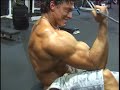 Bodybuilder Denis Sergovskiy trains, poses