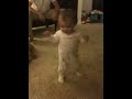 Kate walking from Dad to Mom