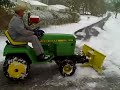 John Deere 318 Pushing Snow