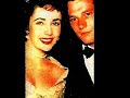 in 1950, dame elizabeth taylor met the man of her dreams. he was nicholas conrad hilton, heir to the hilton multi-million dollar hotel fortune. to elizabeth, her idea of marriage was a little red apron living in a house with a white picket fence. she was 18 and a virgin when she married nicky. two weeks into their three month european honeymoon, nicky started to drink, gamble, and physically abuse elizabeth. she was lost. she was desolate. she had come right from her parent's home into this life of torture. to nicky, he lashed out at reporters following them everywhere, without a moment's peace. he later commented that it was like living life in a fishbowl. it became increasingly harder for elizabeth to hide her physical abuse. she lost weight, started to smoke cigarettes, burst into tears, faint, and developed an ulcer and was put on a diet of baby food. ironically, when a kick in the stomach caused a miscarriage, elizabeth had had enough. she said, 
