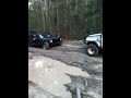 Suzuki Sierra recovers jeep Cherokee