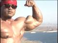 Bodybuilder Ko Chandetka poses peaked biceps