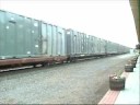 Q-409 with a CSX Bonga and a HLCX SD40-2 in BNSF H1