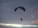 PPG flight hanging from leg straps PPG flight hanging from leg straps