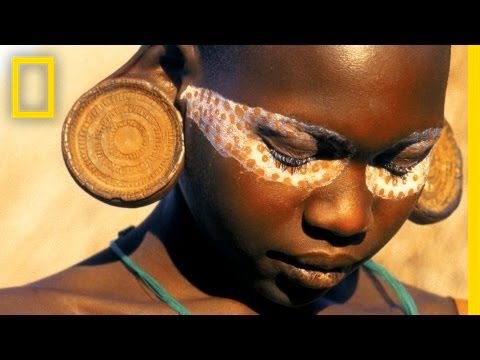 geographic - Photographers Angela Fisher and Carol Beckwith join forces to explore the art of using skin as a canvas, a practice performed to attract the opposite sex, di...