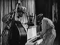 this clip is originally from hellzapoppin'

i got it from a dvd by the www.wfmu.org dj dave the spaz. a rather idiosyncratic production called  'the best of spazz tv'

it starts as a bit of a jam with a collection of well known musicians then segues into a truly stunning dance number.

slim gaillard - piano, guitar
slam staewart - bass
rex stewart - trumpet
elmer fane - clarinet
jap jones - trombone
cp jonstone - drums