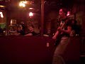 "The Earaches" playing "Hit with a zit" at "The Muddy Cup".