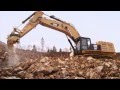 Cat® 390F L Excavator at Work Ripping Large Rocks