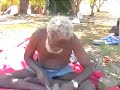 this is part 1 of dha:wu'mirr dharpa, a story about message sticks by gumatj elder andrew galitju.

part 1 and 2 of this story shows galitju making message sticks. galitju, yirrirnirnba and mirarra' provide commentary on how old people used these message sticks before telecommunications, paper, and air travel found their way to arnhem land.

for those interested in yolngu language and culture, additional written comments will be added here in due time, to aid in your understanding of yolngu grammatical structure as well as to expand your vocabulary.

a bit about galitju... as well as making an appearance in the feature film yolngu boy, andrew galitju is known throughout arnhem land and the 'top end' of the northern territory as a legendary hunter, cross-cultural educator, and all-round nice guy.

when i first met galitju some 10 years ago, it was with yolngu friends who paid him a visit in order to purchase turtle meat from his deep freezer. there is always a ready supply of magpie goose, stingray, fish, turtle and other culinary delights in galitju's house!

galitju is my 