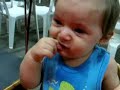 Emi with her father, eating a lime