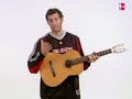 Rudy Fernandez on acoustic guitar
