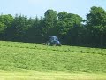 New Holland TS110-A and Claas Tedder