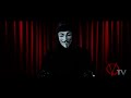 i think the speech and the background music go very well together, with major chords being played when words with positive meanings are being told, and minor chords for the negative ones.

below is the speech delivered by v:

