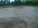 Team Losi Muggy bashing in the dirt/sand