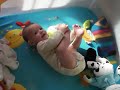 Cillian standing in play pen