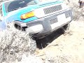fj going up a hill, no a-trac
