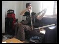 Couch Sufer Plays Musical Saw