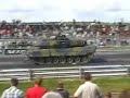 Leopard 2A5 tank smashes two cars