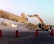 هدم باب الخلا بعنيزة ( البوابة الغربية) 