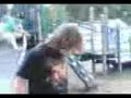 watch the kid on the slide in the backgound! LMFAO
