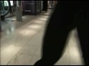 Candid walking in 5\" stiletto sling backs through a store