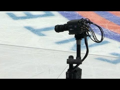 Video: Clutterbuck's clearing attempt hits camera, puck stays in play to avoid penalty