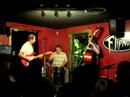 the eric hokkanen trio live at flipnotics 7/25/06 (eric hokkanen, lead; ryan gould,  bass; rick, drums) with friends at flipnotics cafe in austin, tx on 7/25/06.