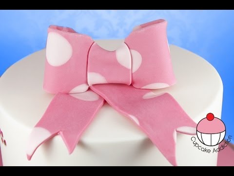 how to - Learn how to make this cute Polka Dot fondant bow using fondant or modelling chocolate. This is to go with my Minnie Mouse giant cupcake tutorial, due out Mo...