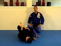 pro-star mma grappling director jerry jones teaches the triangle choke from guard with two of his students: matthew z and 2007 naga world champion tony amorin, from jerry jones prostar pro-star www.prostarmma.com kickboxing grappling kick boxing thai mixed martial arts mma ufc ultimate fighting championship pride ifl ultimate fighter joe brignoli joey joseph jerry jones john graden david bybee frank shamrock chuck norris liddell bas rutten mata teachers association kids karate taekwondo tkd drills clearwater palm harbor fl florida nutley nj new jersey kids jab cross overhand right hook to body uppercut upper cut focus pads mitts sparring games left hook thai kick straight right straight knee thai knee clinch full mount side mount escape roll guard half full butterfly head north south takedown take down single double sprawl arm bar hammer lock hammerlock reverse keylock key lock bearhug bear hug forearm fore arm snatch low leg headlock front fight stance fighter defense 1 2 3 4 stand up standup position full nelson pass catting out guillotine counter scoop class classroom movement knee kneebar pummel over and under plum tie up tie-up block blocks warmup warm-ups warm ups spin active standing ankle pick foot touch back backward backwards jump side sidekick hook front transition combo combination duck slip evade weave submission submissions www.martialartsteachers.com