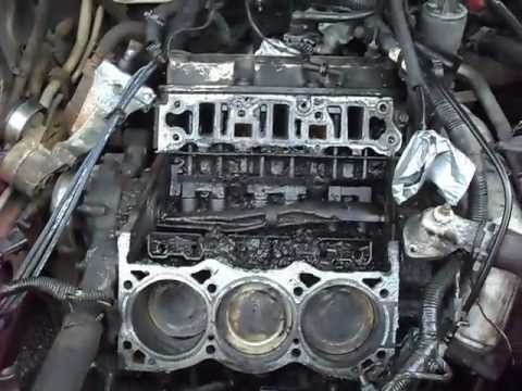 BUICK V6 LOWER INTAKE MANIFOLD AND HEAD GASKET REMOVAL.