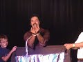 tony brent performing in the outta control comedy magic dinner show in orlando, florida