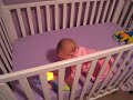 Megan in her crib