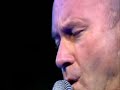 Phil Collins performs Another Day in Paradise on his farewell tour in 2004 in Paris.