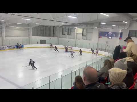 U16 - Nole moves the puck under pressure, follows the play up the ice to gets a shot off.