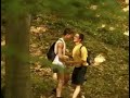 beautiful boys kissing in the woods