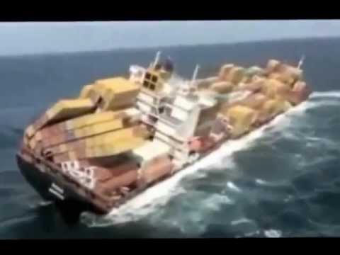 ship runs aground - Mega Container Ship Rena, 236 meters(774 feet) long with a container capacity of 3351 20ft containers, ran aground off the coast of New Zealand.