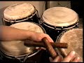 This is the second video that follows tips for how to play clave sticks. Its actually the Rumba Clave. Take a look below for noted info on understanding how Rumba Clave is played. 3 side = first 8 beats 2 side = second 8 beats Count 1 + 2 + 3 + 4 + | 1 + 2 + 3 + 4 + (How many beats is that? 16 right) On the three side (strike the clave) on (beat 1, and of 2, and of 4 On the chart thats 1 and the plus sign of 2 + and the plus sign of 4 + On the two side (strike the clave) on (beat 2, 3) When you play that counting for a while and use a metronome with faster tempos as time picks up you can count the 4/4 time and play the notes in the full clave phrase. 1 e + a 2 e + a 3 e + a 4 e + a (how many beats is that? 16 right) Thats 4/4 with the 16th notes counted. Lets see if you can figure out where the clave notes fall in the time signature. Note: I started with the Rumba clave before Son because I like to play Rumba clave most. Then Ill show you Son Clave in my next video so start here then move on. Don't forget to rate and/or subscribe. You can also visit me below: www.myspace.com
