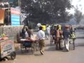 By a cycle rickshaw to the main street.