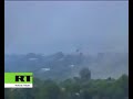 Geogian helicopters plastering South Ossetian dwelling houses