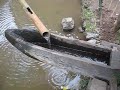 Water-powered rice-pounding mortar
