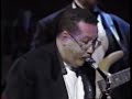 paquito d'rivera on alto sax, playing in front of latin band + orchestra; live on a pbs special called 